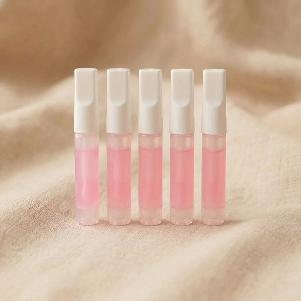 Glow Glue 5-pack – vijf tubes roze vloeibare nagellijm op beige linnen