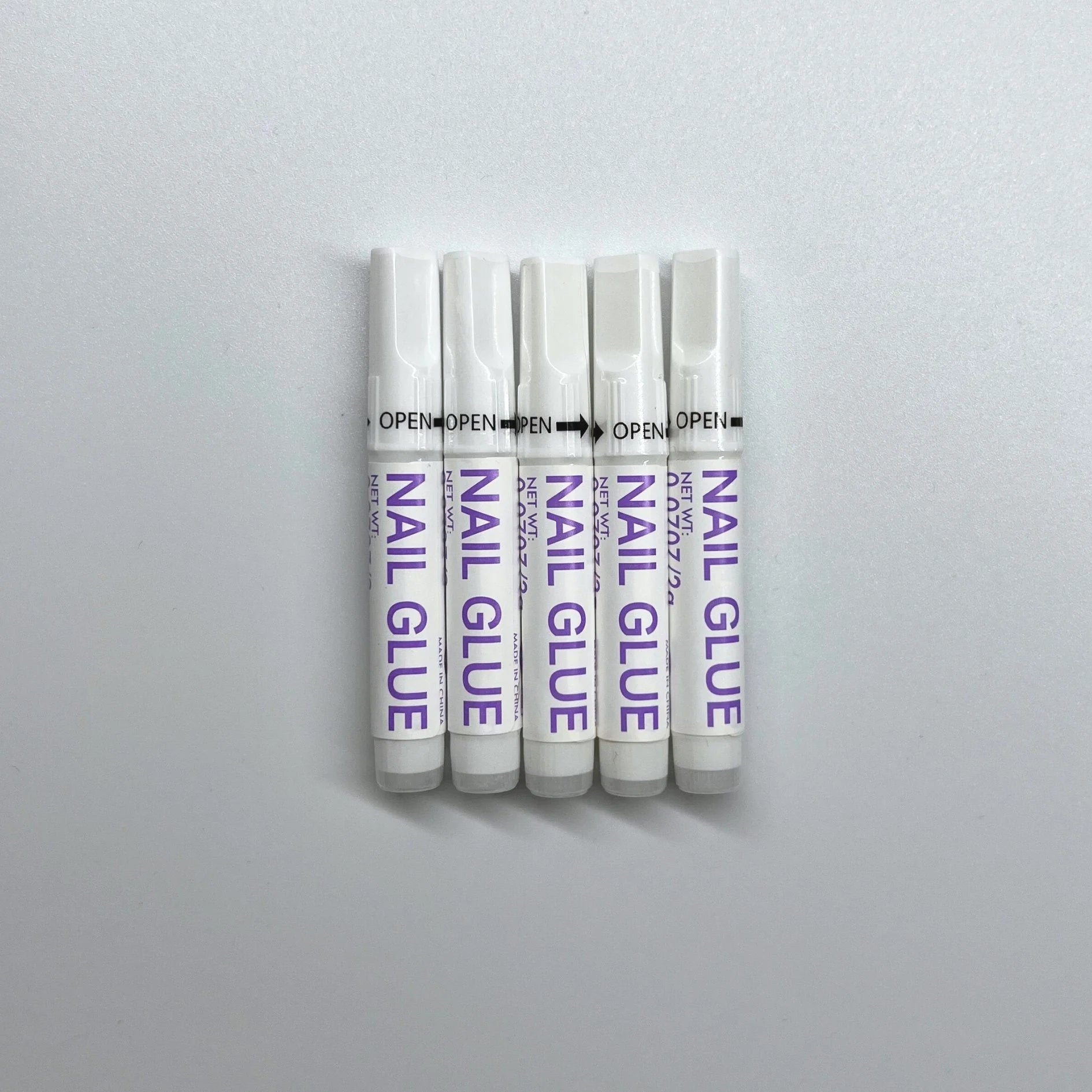 XGlue nagellijm 5-pack – vijf tubes Nail Glue gestapeld voor langdurige press-on houvast